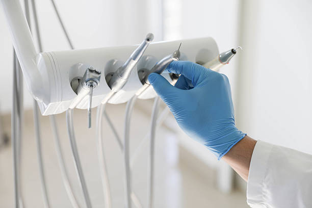 Professional Tooth Extraction technician working in De Soto, IA